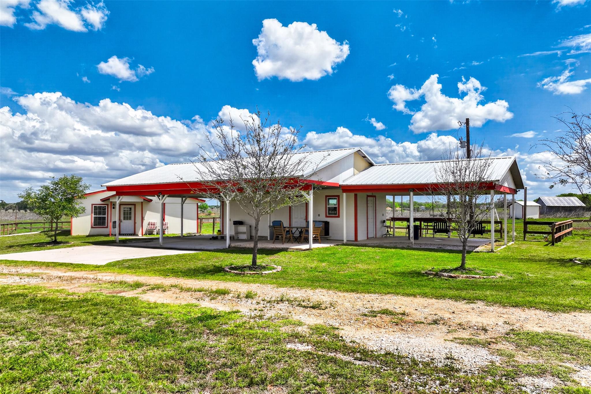 A spacious covered patio provides ample outdoor l