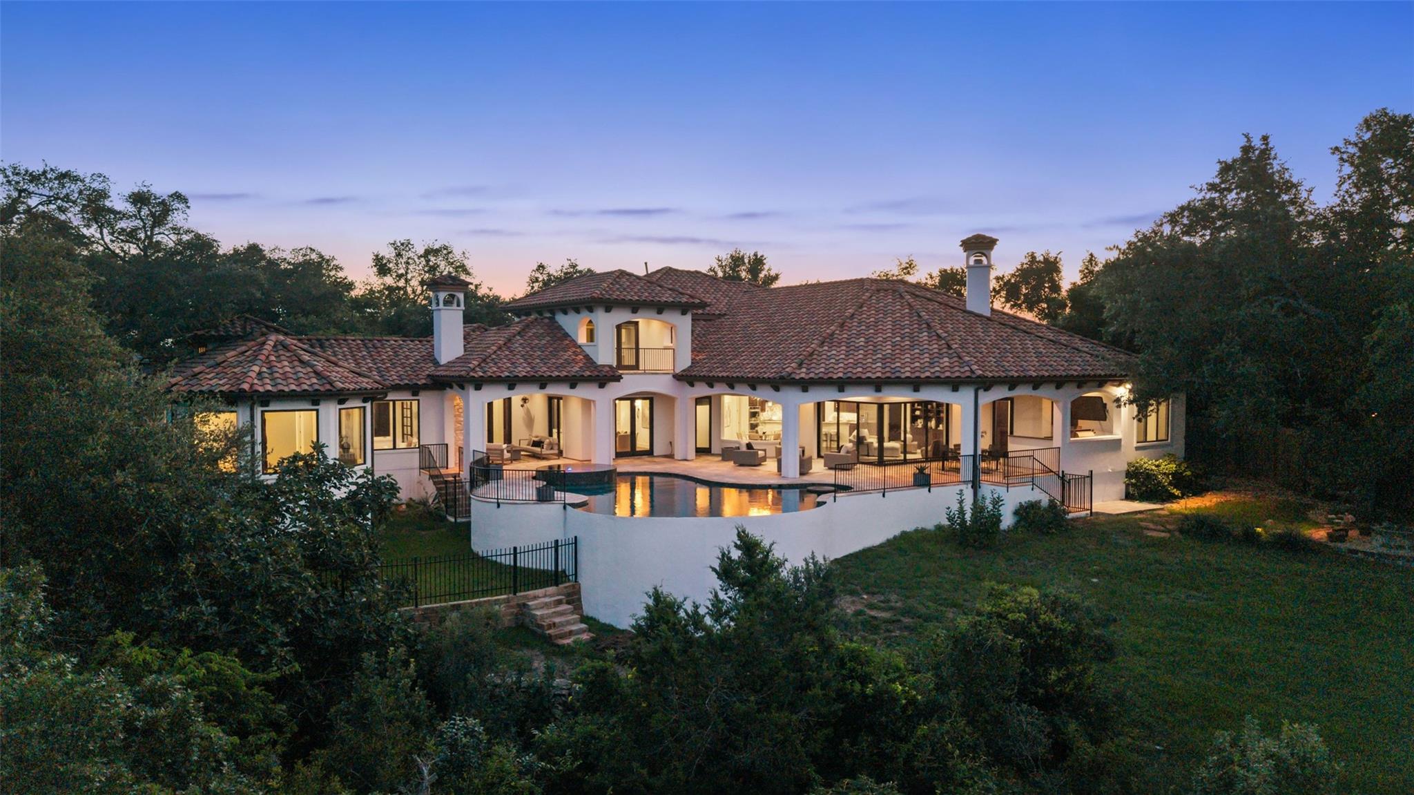 An inviting exterior of a beautiful Spanish-style