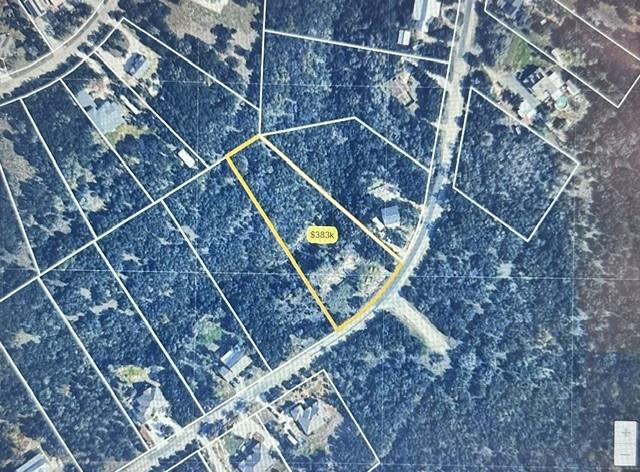 Discover a spacious, wooded parcel offering ultim