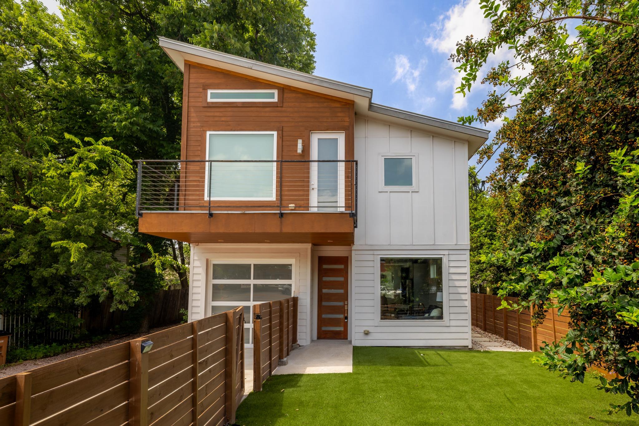 A modern facade with striking wood and white sidi
