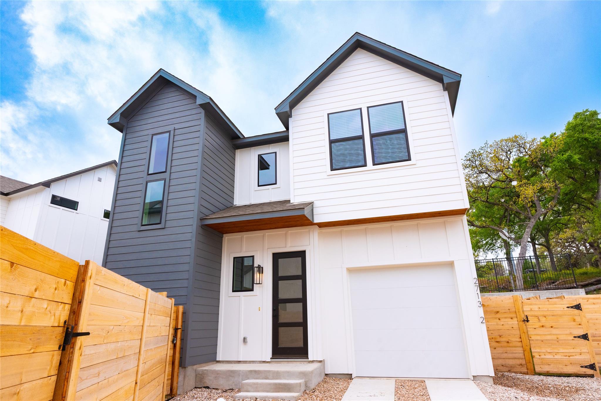 A striking modern facade with contrasting siding 