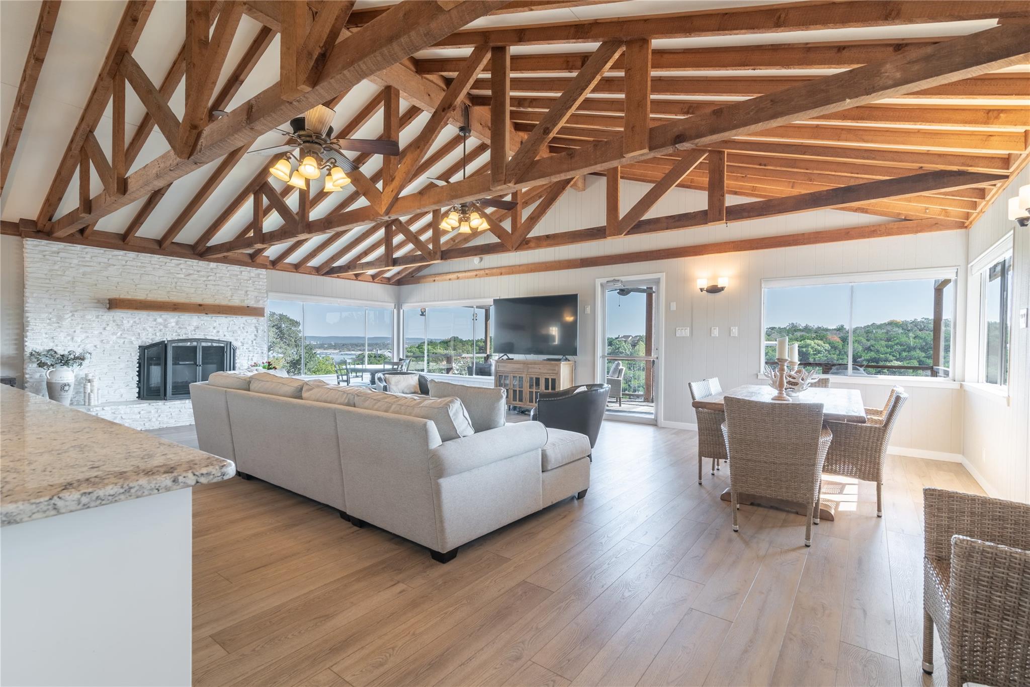Exposed beams complement the open-concept living 