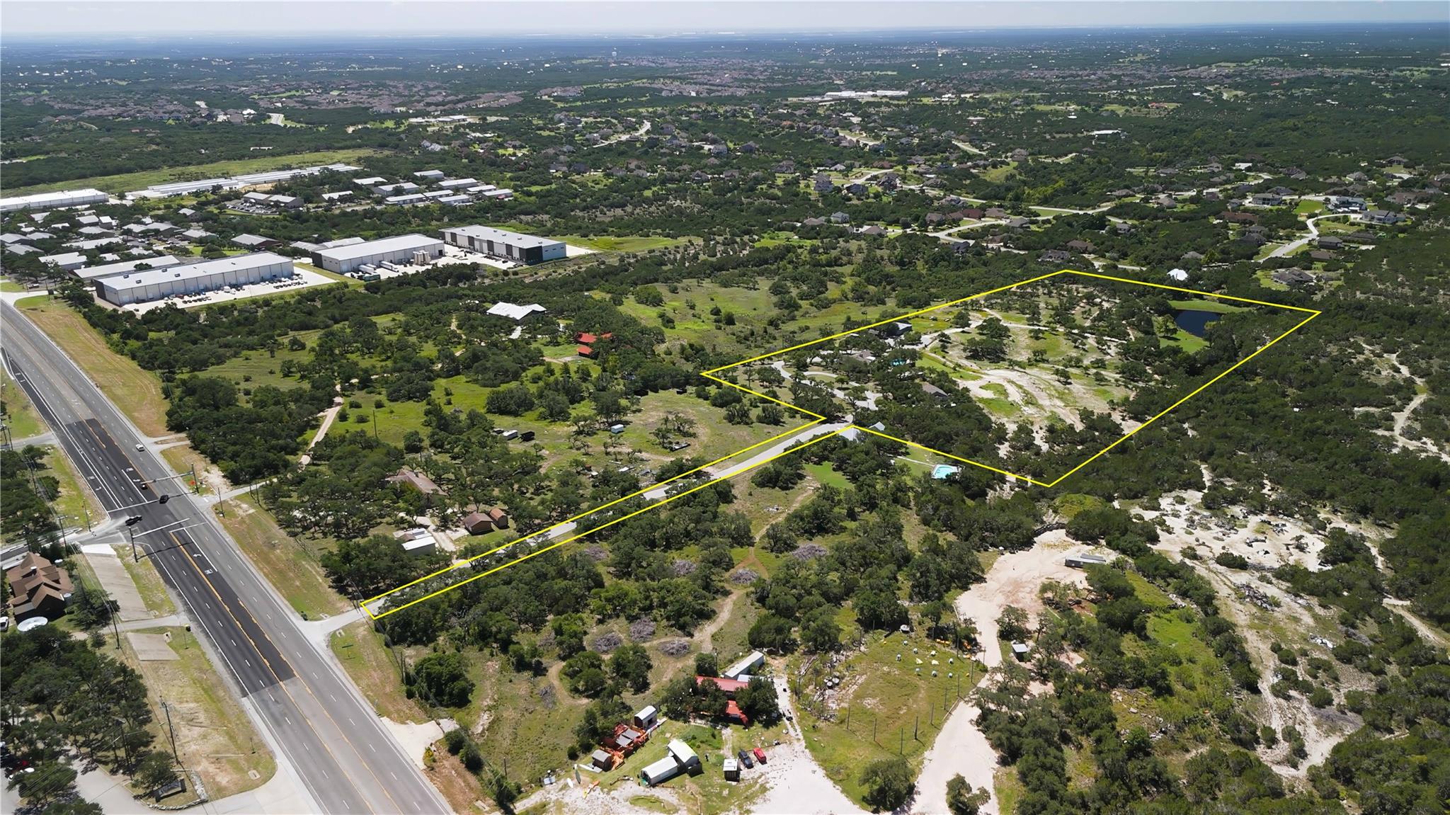 An aerial perspective reveals a vast land parcel 