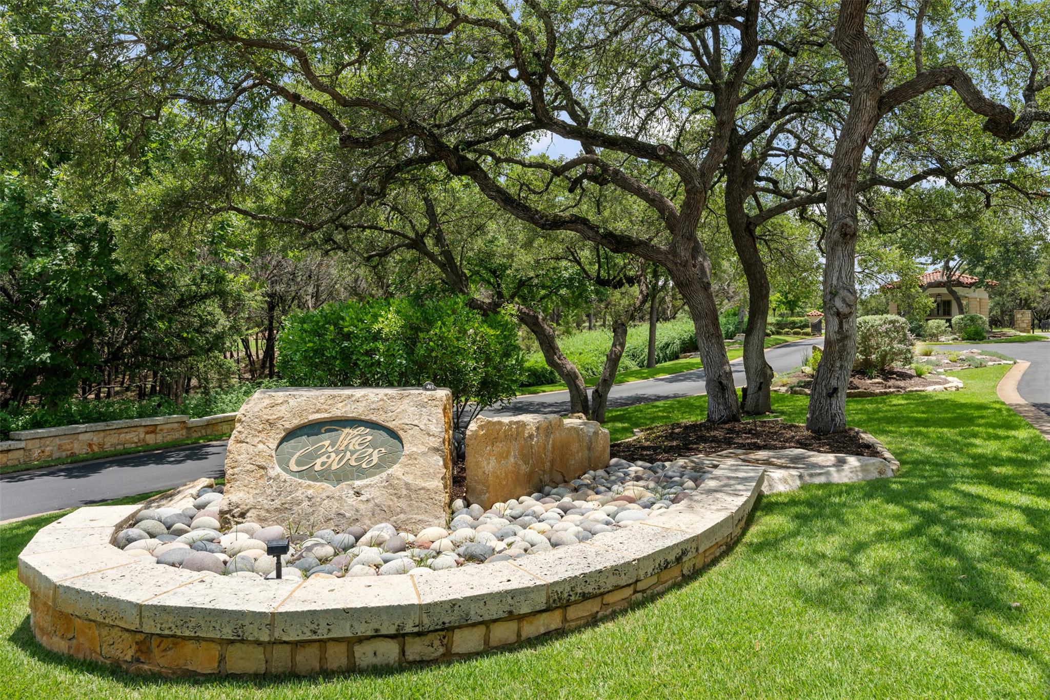 A welcoming stone monument marks the entrance to 