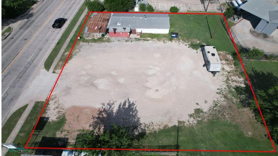 A promising commercial lot awaits, boasting exten