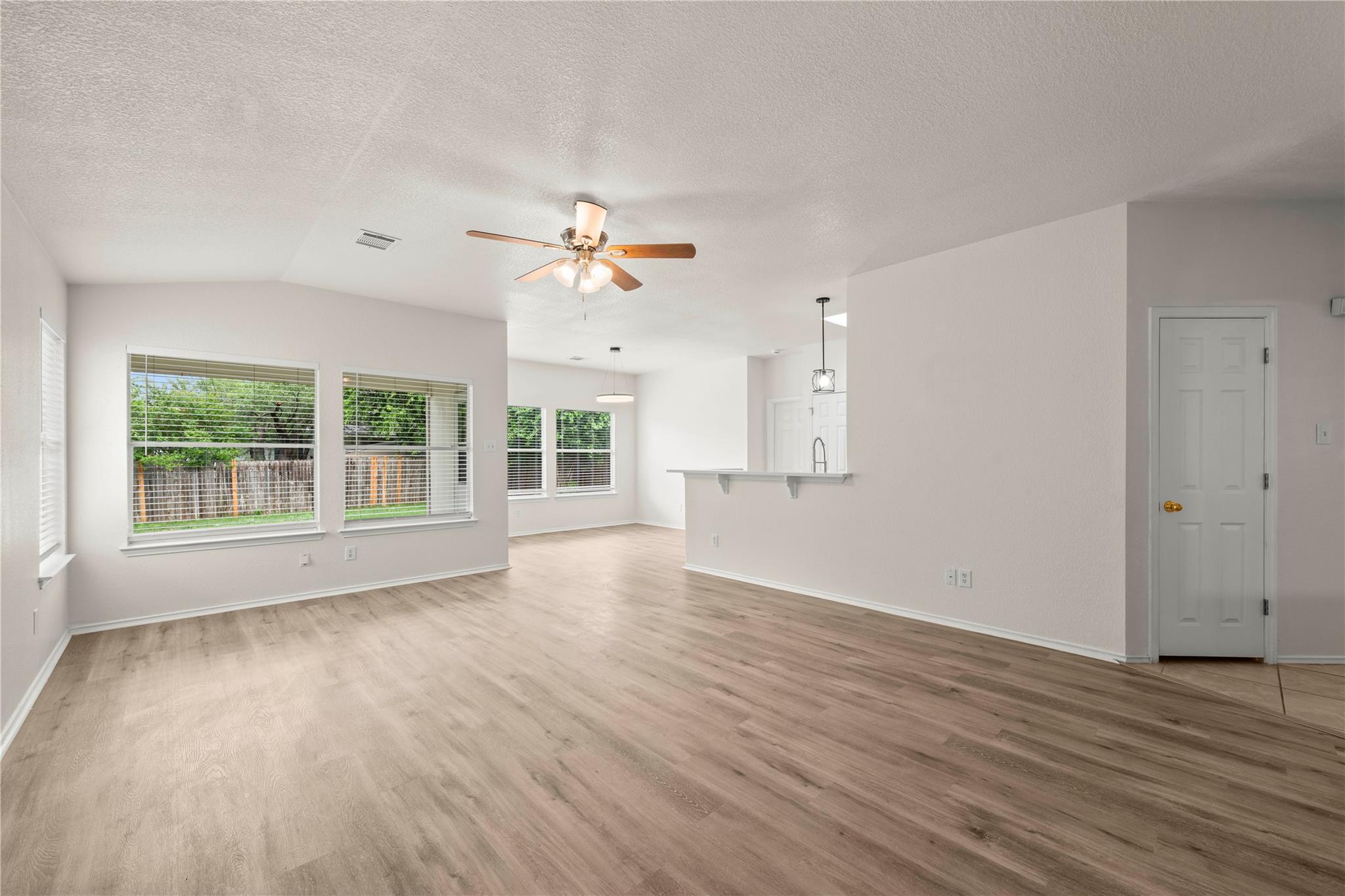 Luminous living space featuring durable vinyl pla