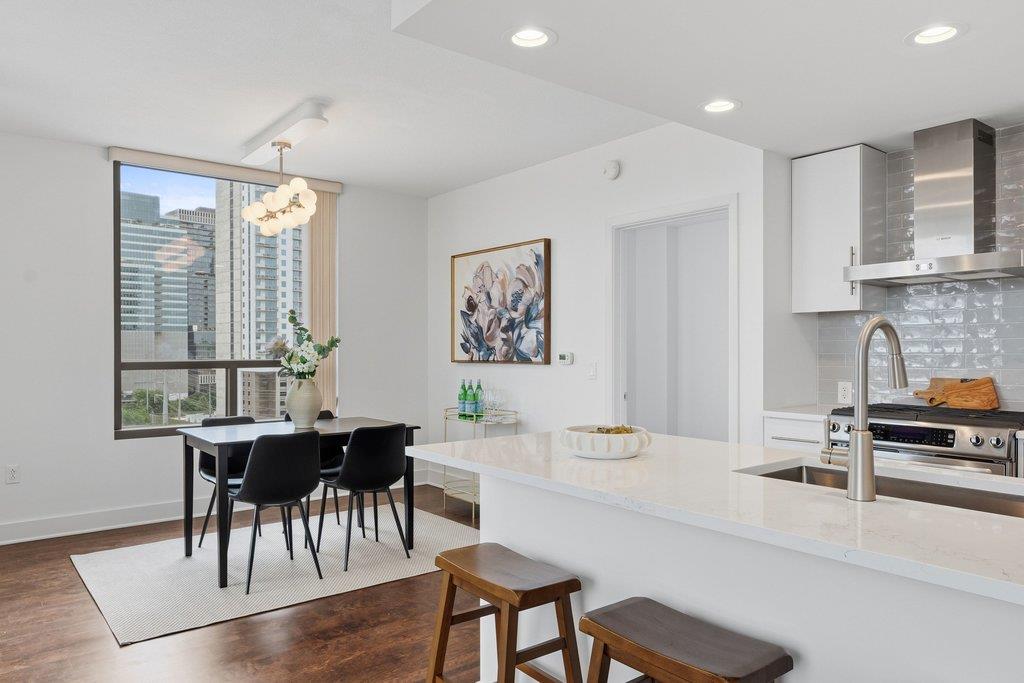 City views frame this open-concept living space, 