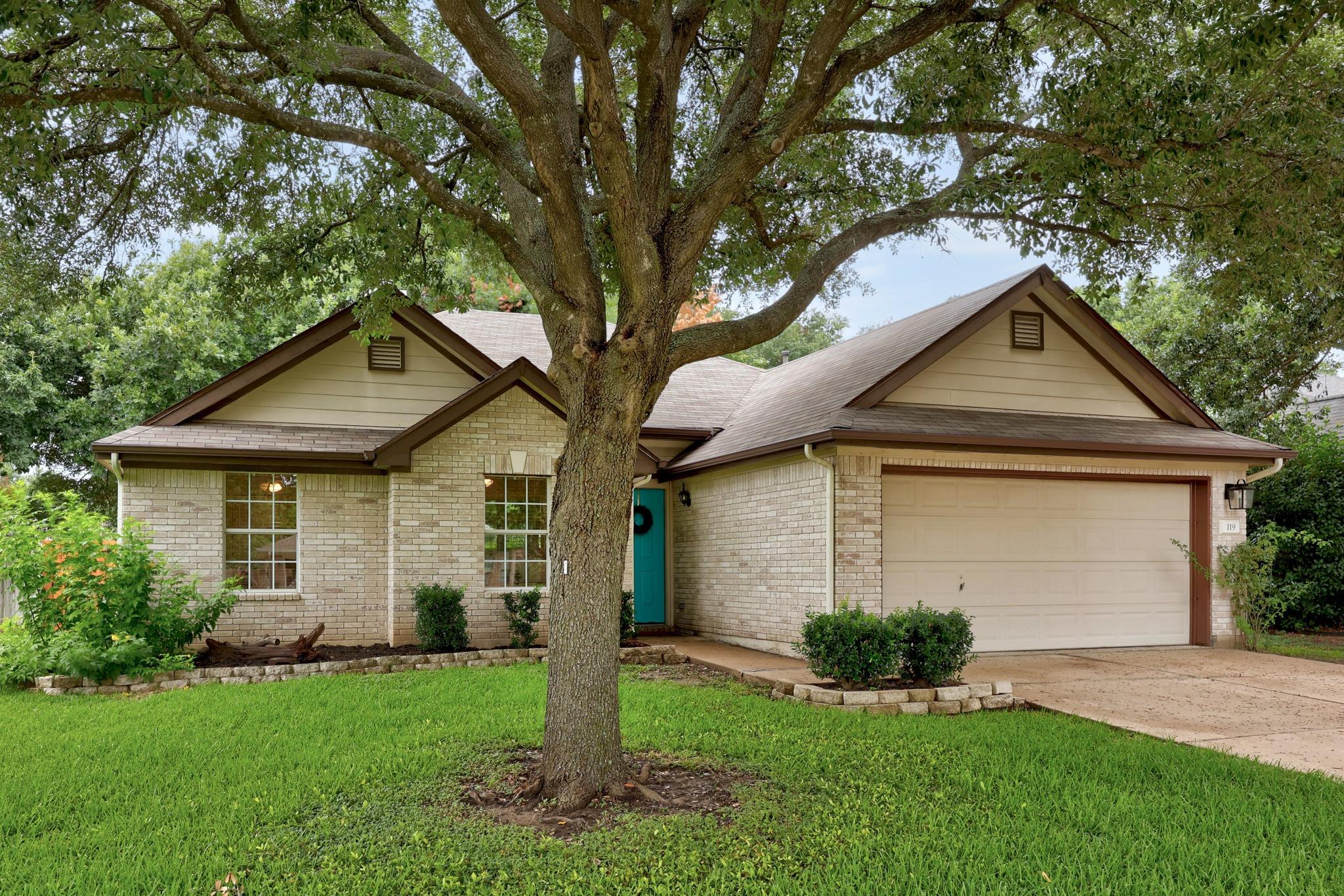 A well-maintained facade with brick accents and a
