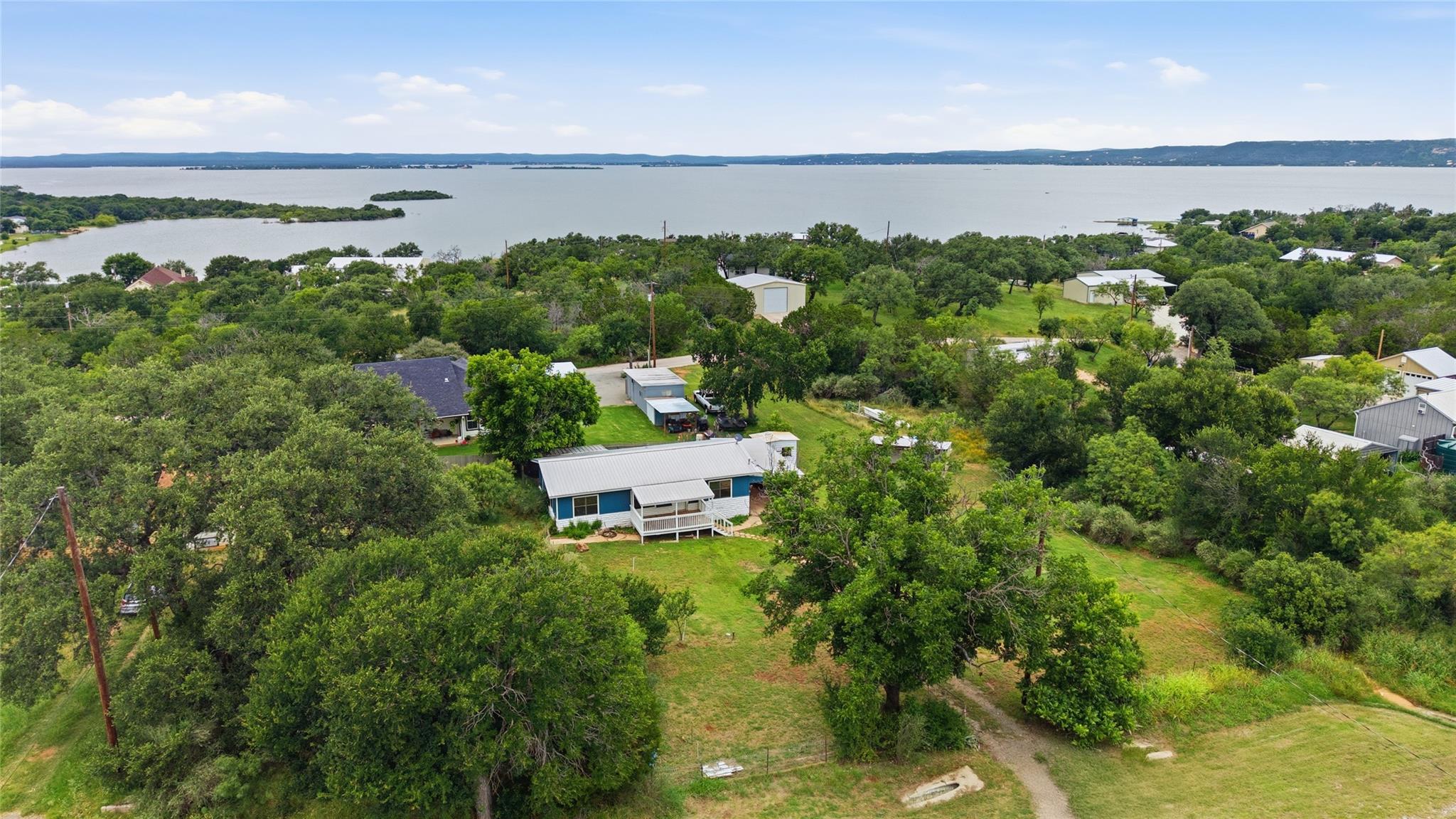 Perched above the water, this serene property off