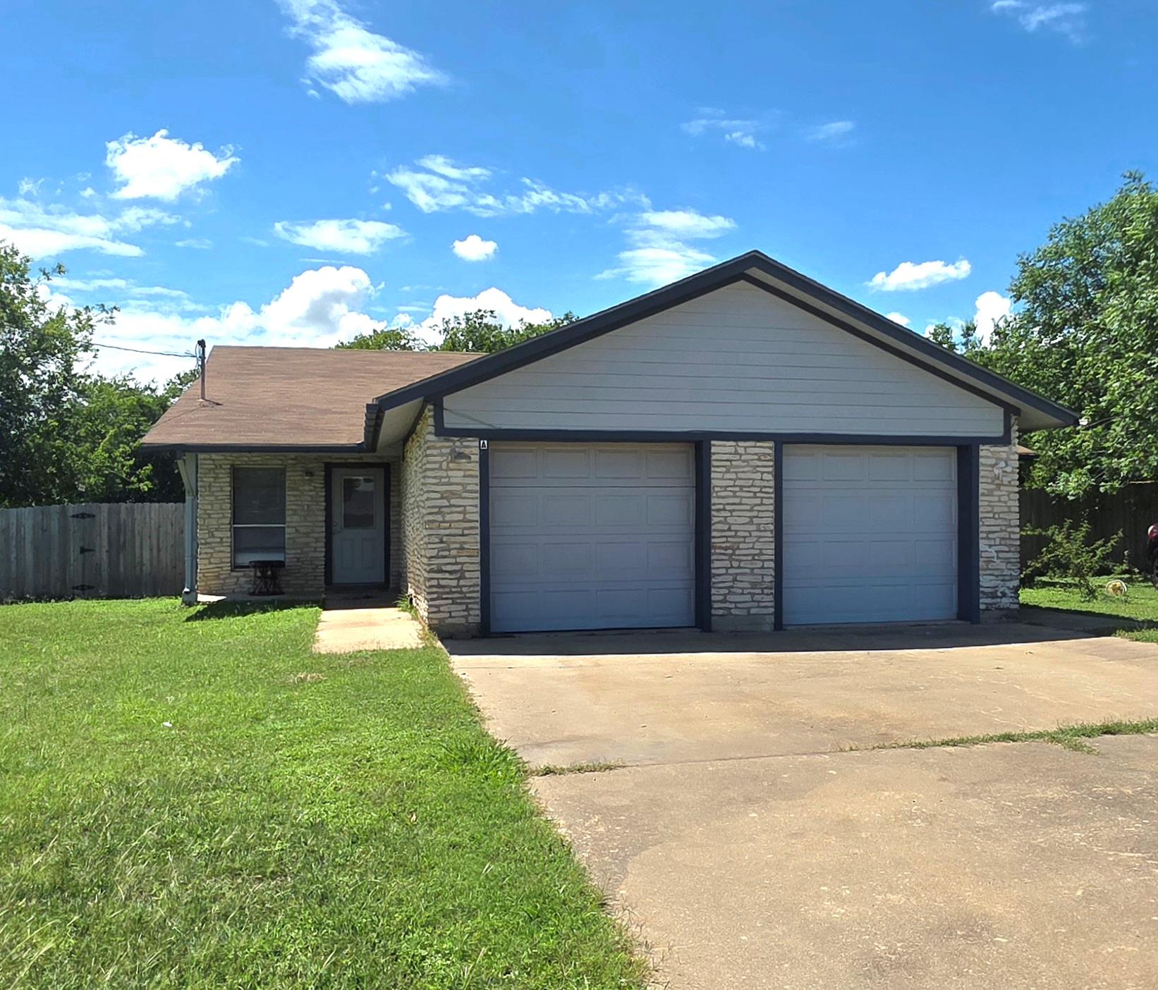 A classic facade showcasing a two-car garage with
