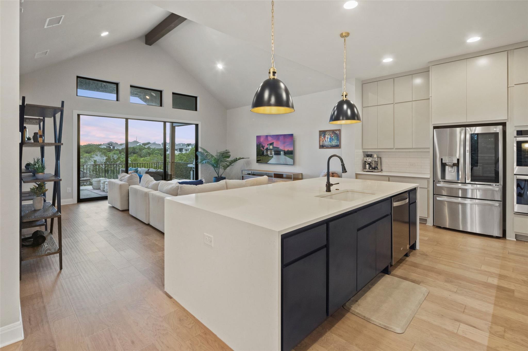 Vast living and kitchen areas flow seamlessly wit