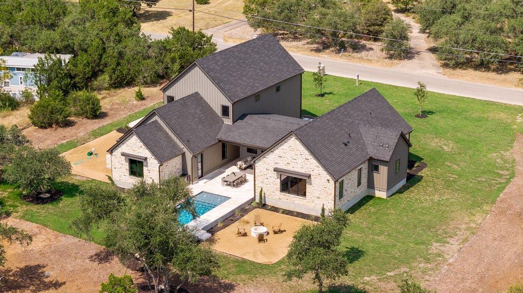 An aerial perspective showcases a modern stone an
