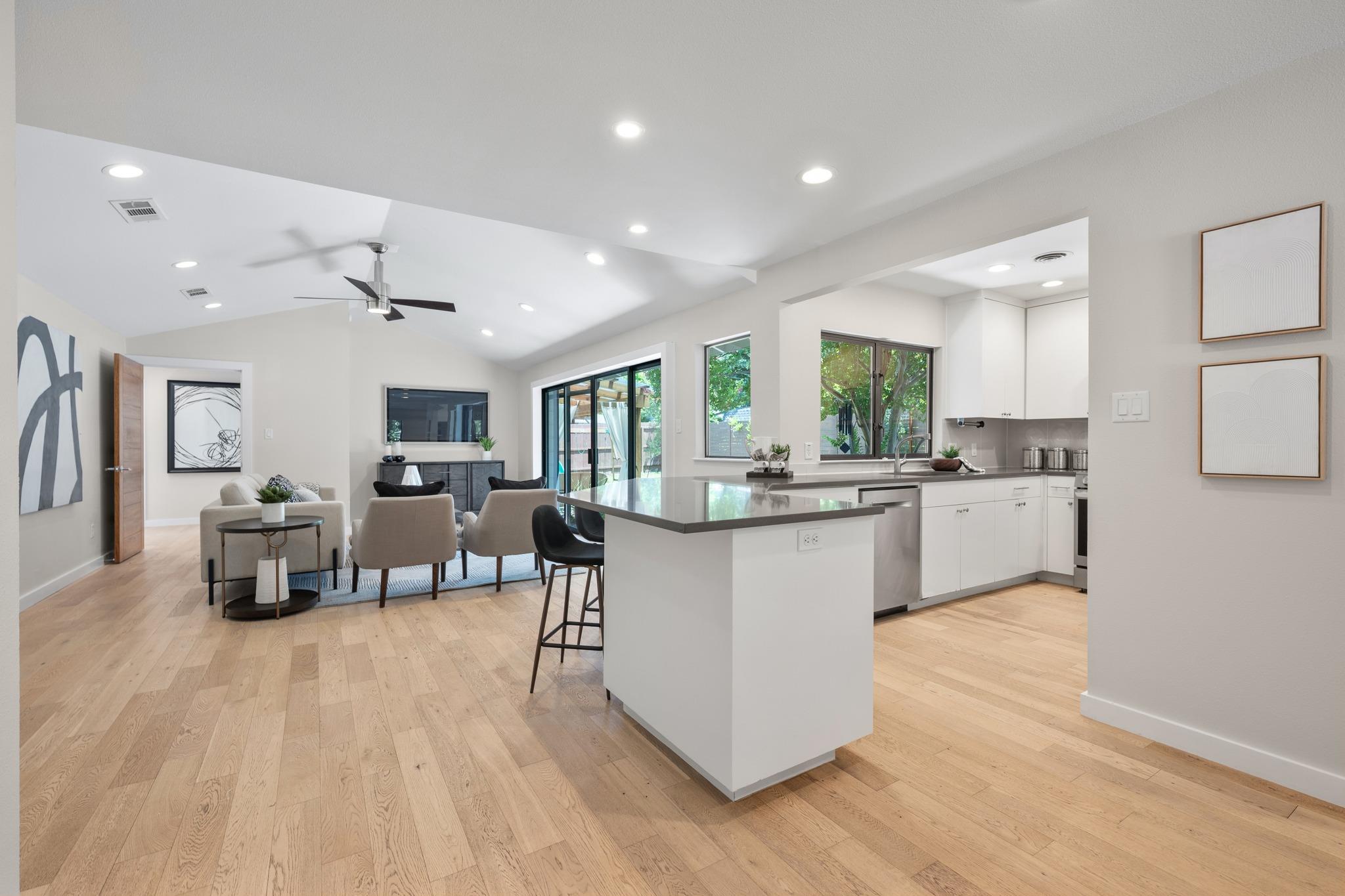 An open-concept layout showcases the bright kitch