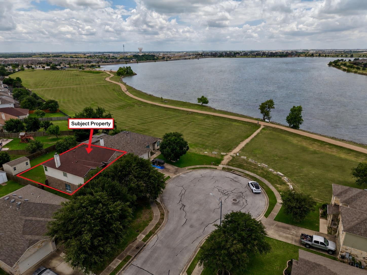 An aerial perspective reveals a prime lakeside lo