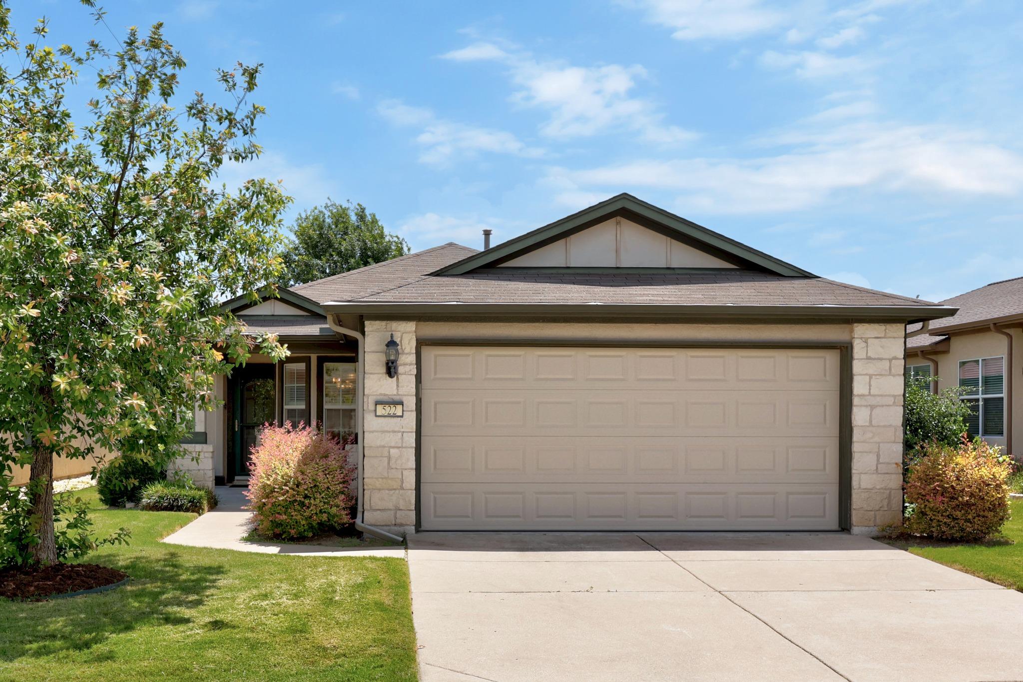 A well-maintained facade with stone accents and a