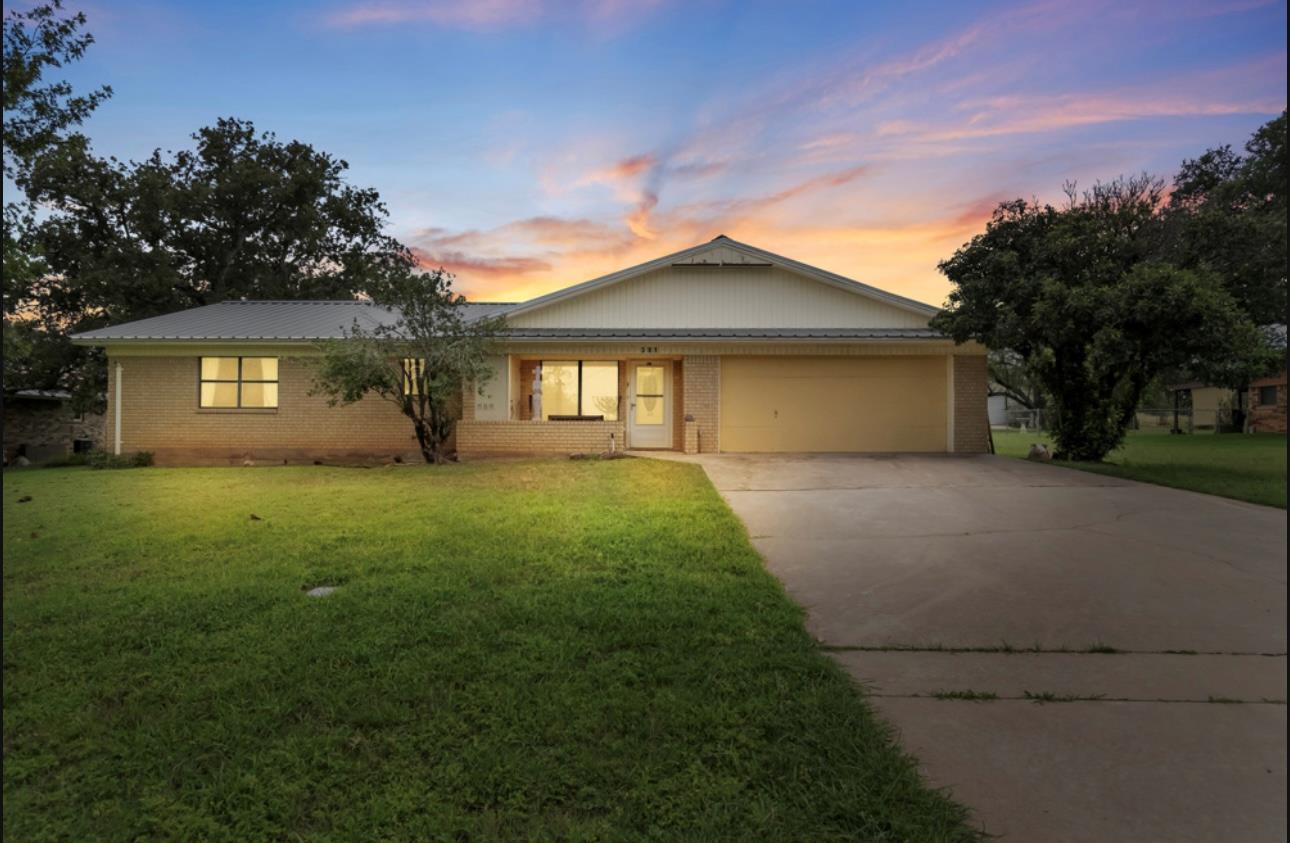 Discover a charming single-story home with a wide