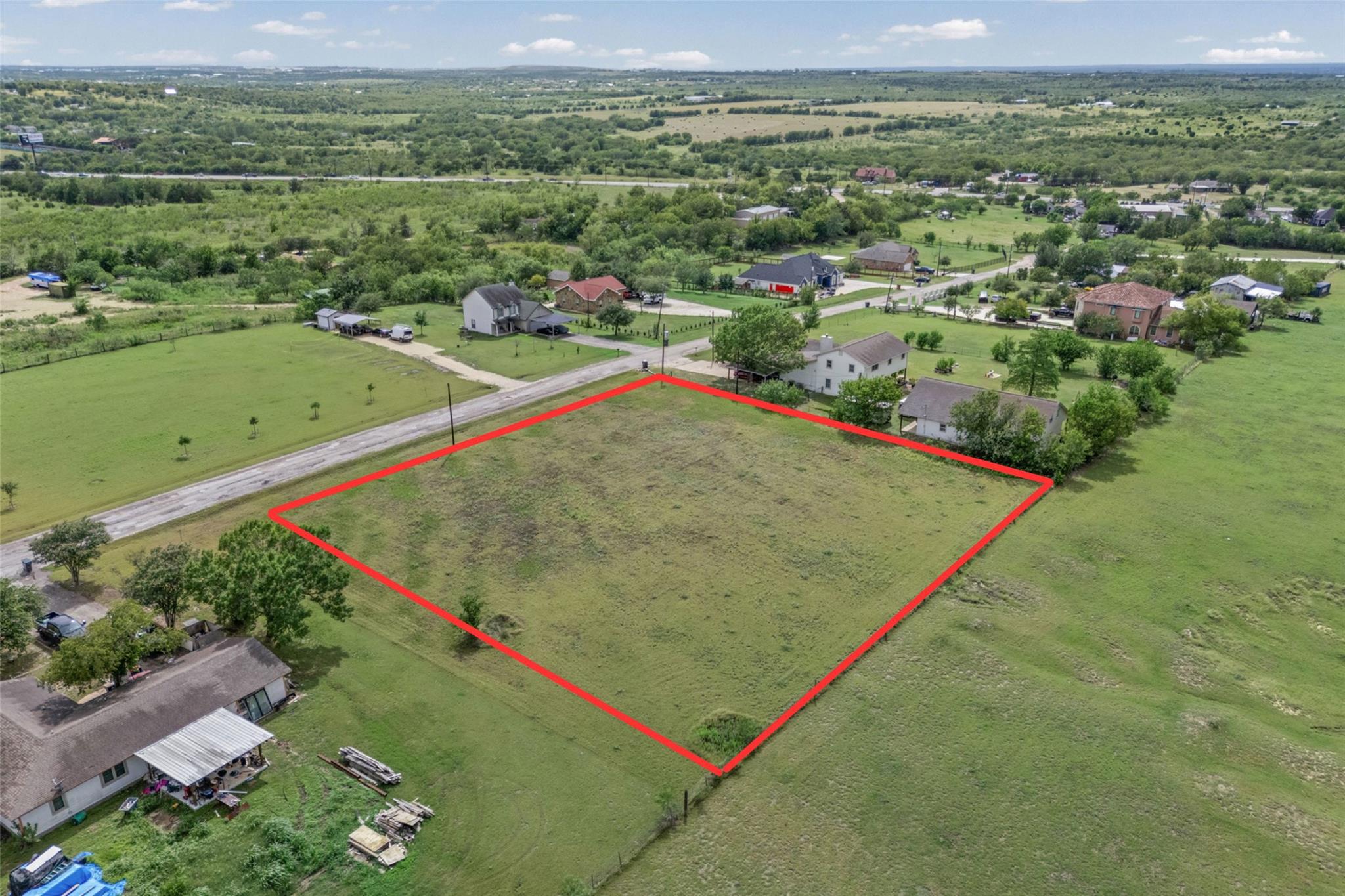 A verdant, open lot presents an ideal setting for
