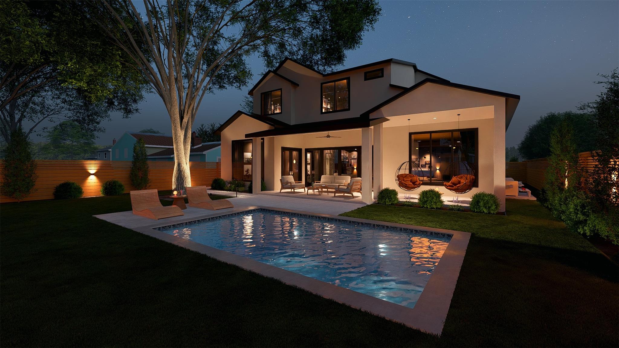 An inviting pool and patio area complement this r