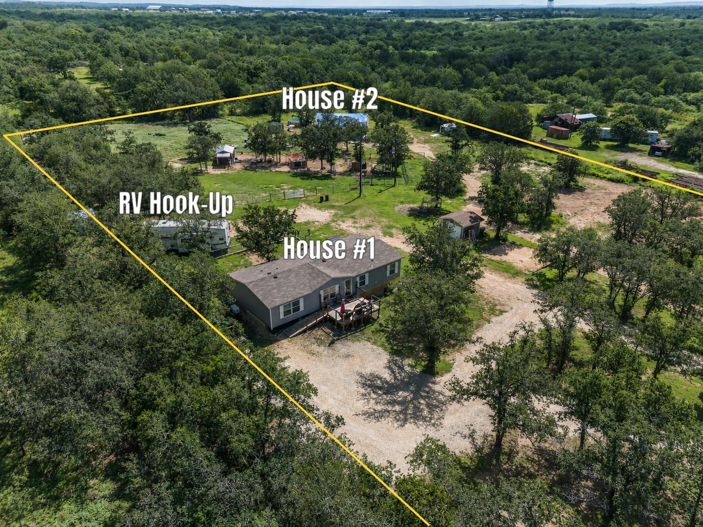An aerial perspective showcases a spacious proper