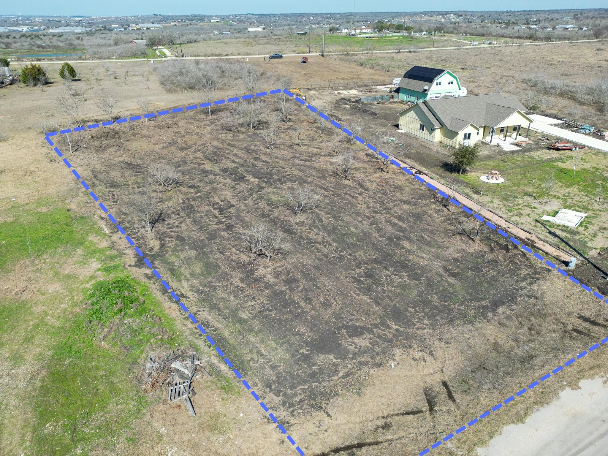 Aerial view of sparsely populated area featuring 