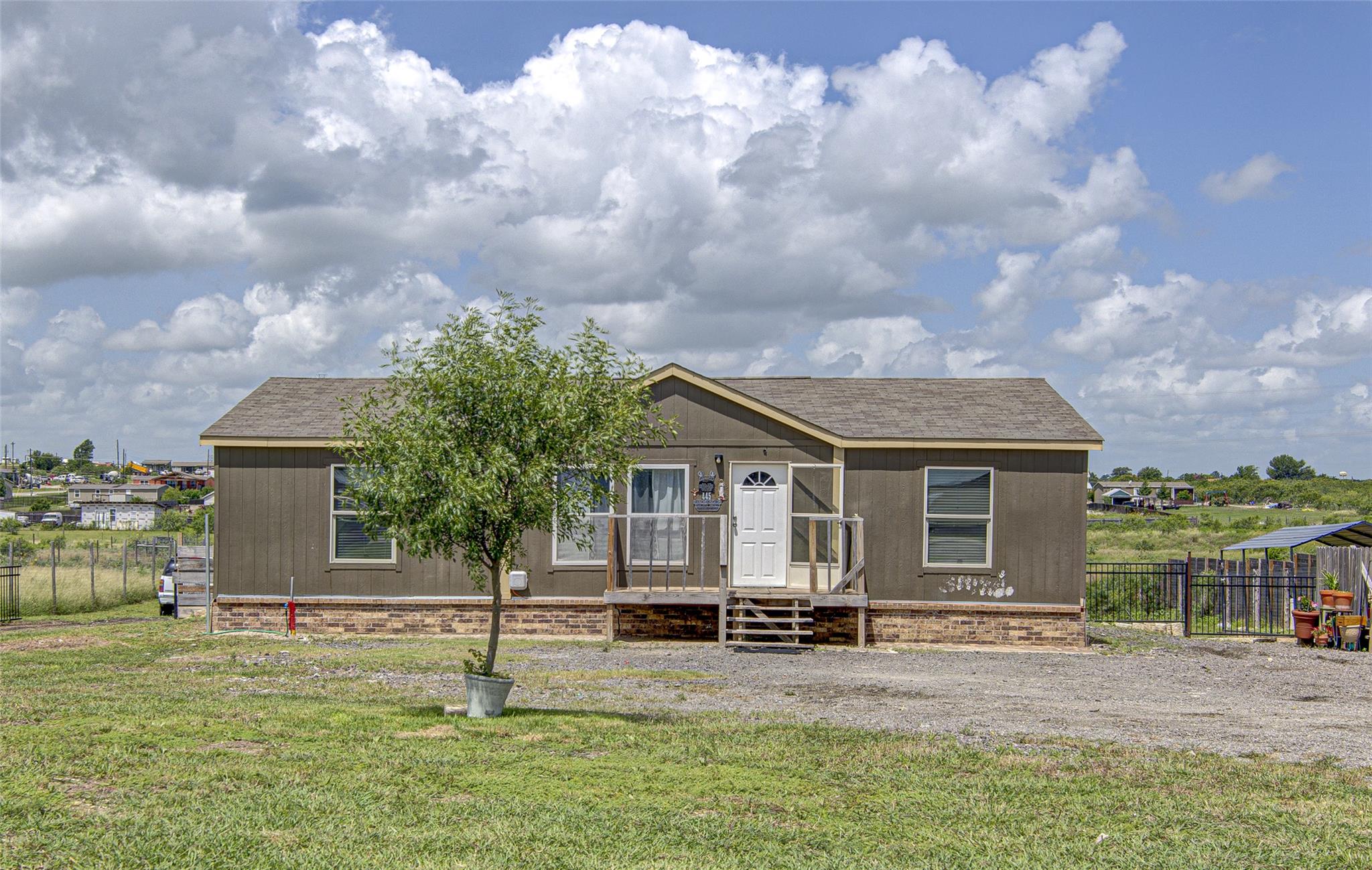 A well-maintained home awaits, featuring a welcom