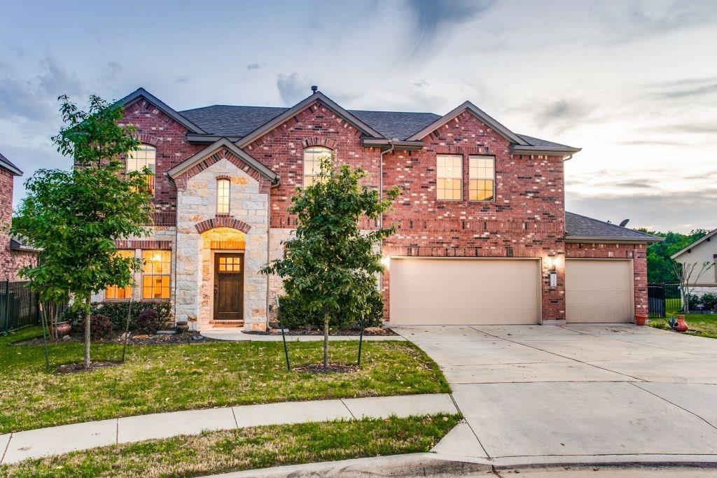 Brick exterior featuring a stone archway entryway