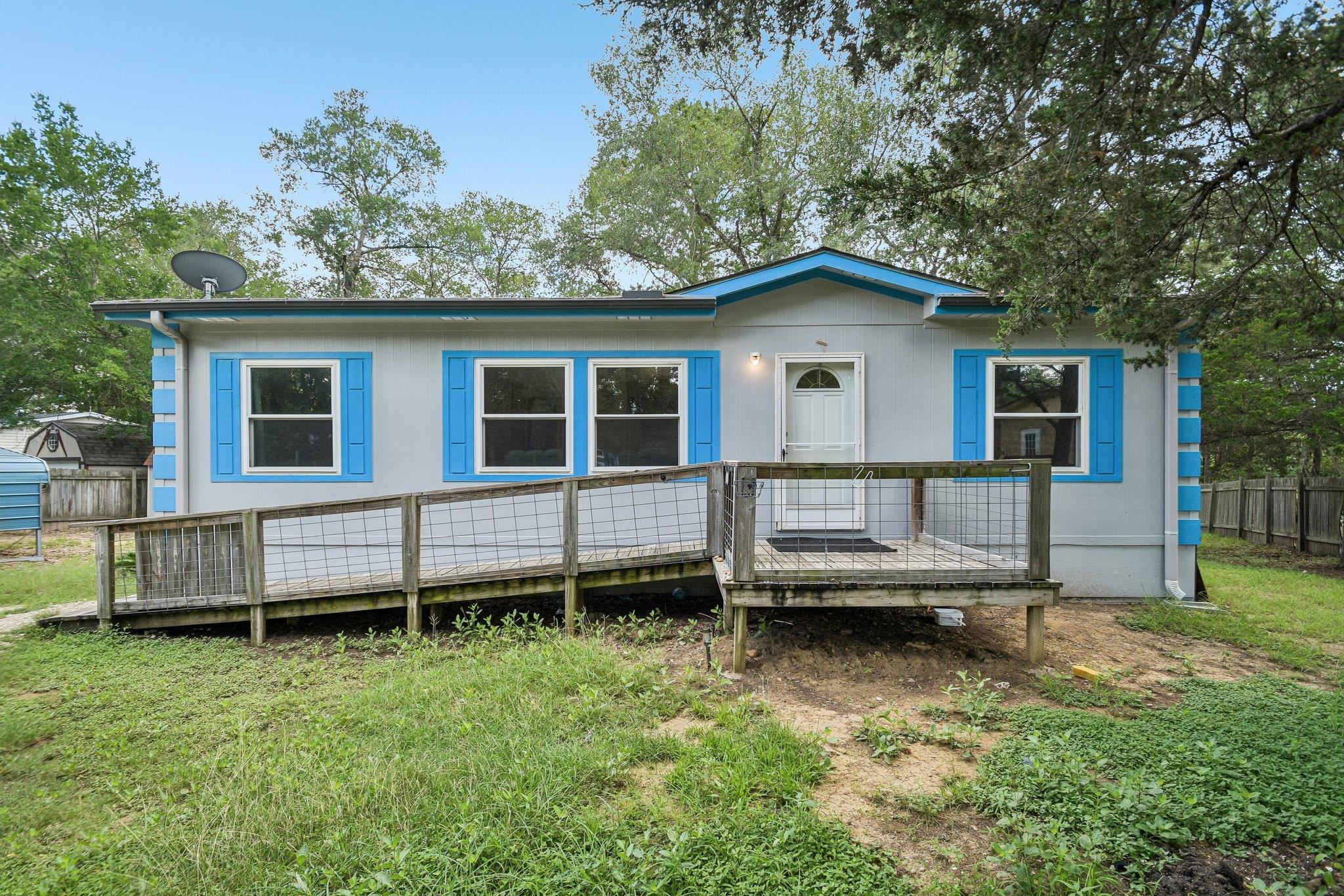 A welcoming front exterior with an accessible woo