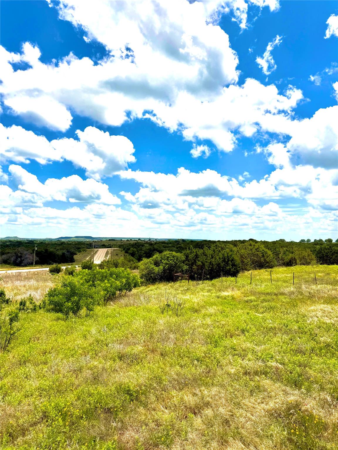 A sprawling rural landscape offers serene pasture