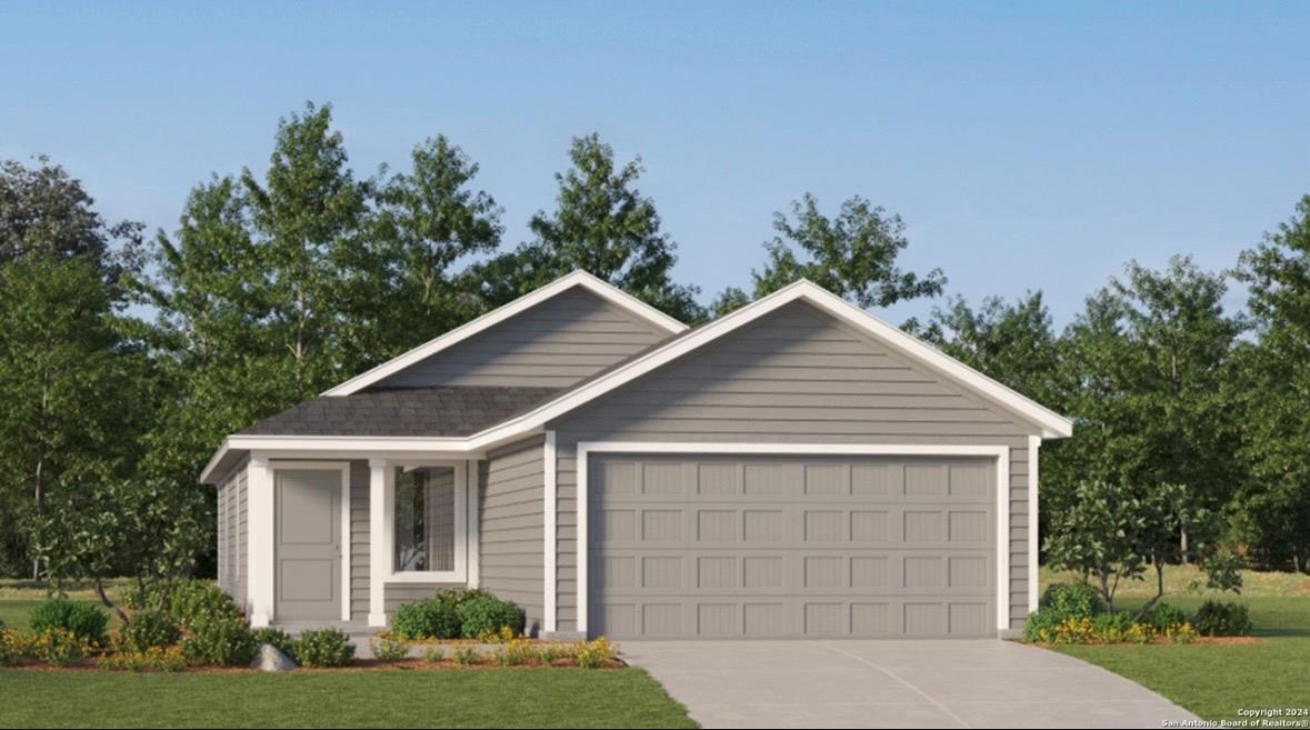 A welcoming facade with tasteful landscaping and 