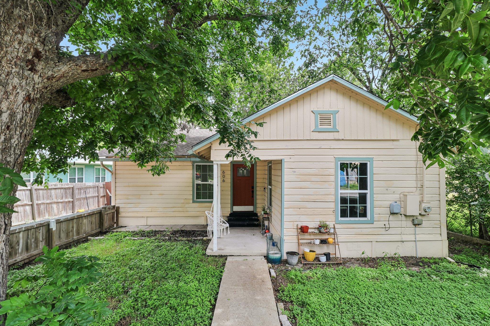 A welcoming front porch leads to this charming ho