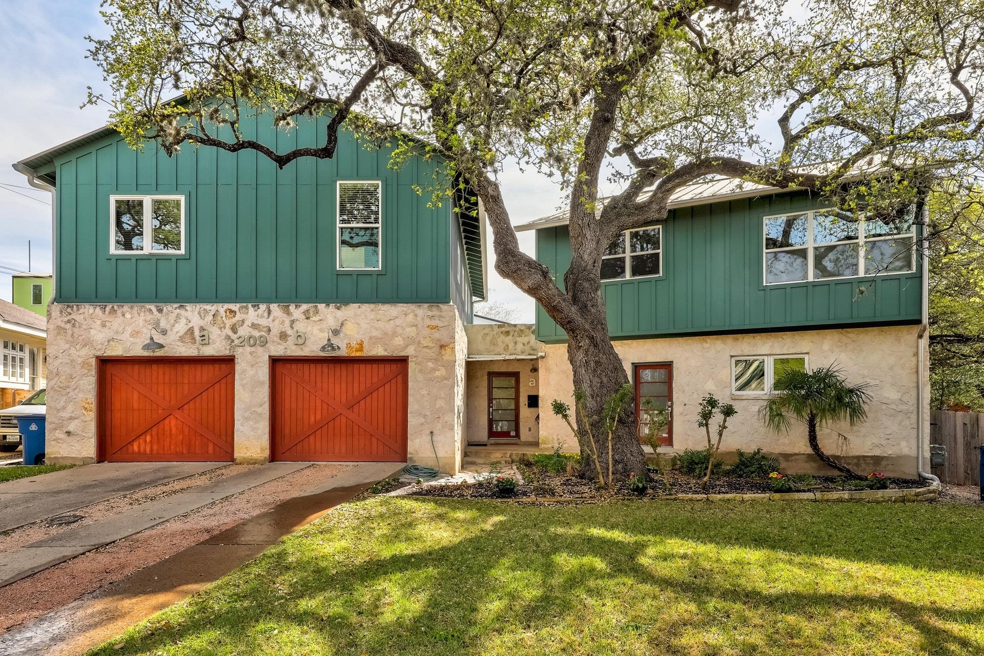 A striking exterior featuring a blend of green ve