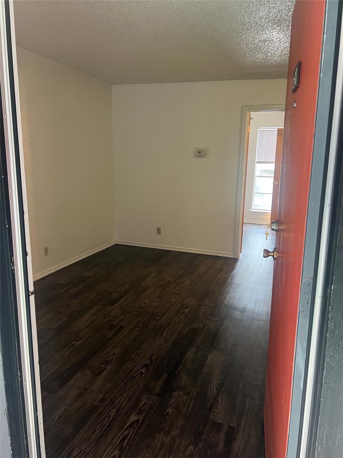 Rich hardwood floors welcome you into this cozy e