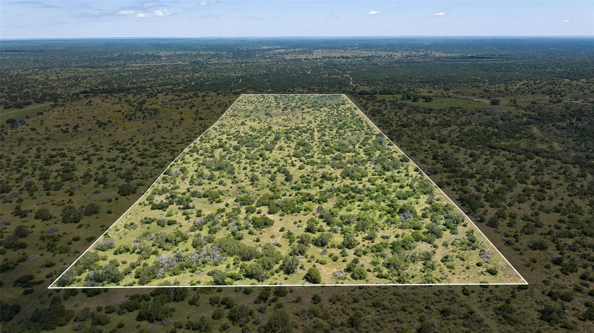 A vast, open expanse of undeveloped land awaits n