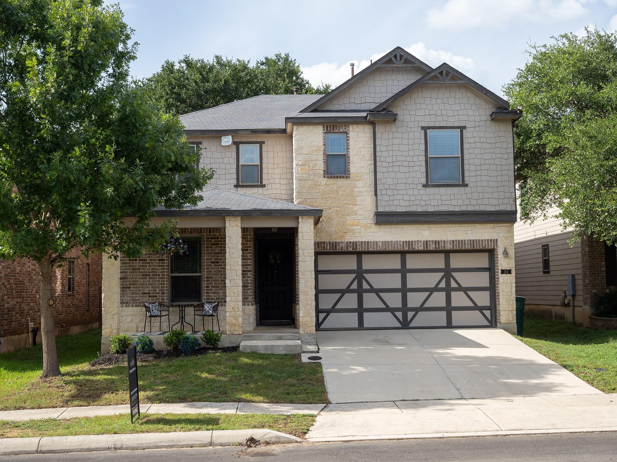 A charming two-story residence presents a mix of 