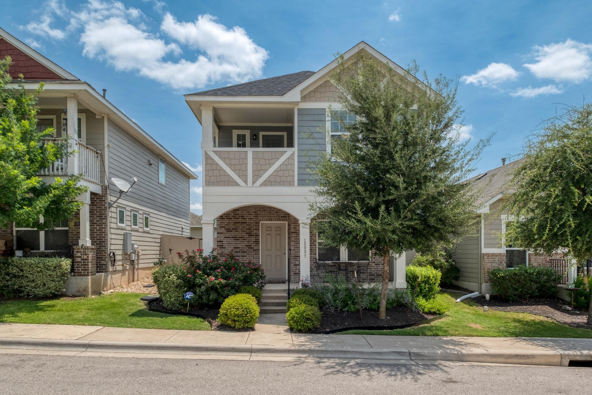 A welcoming facade with a charming front porch in