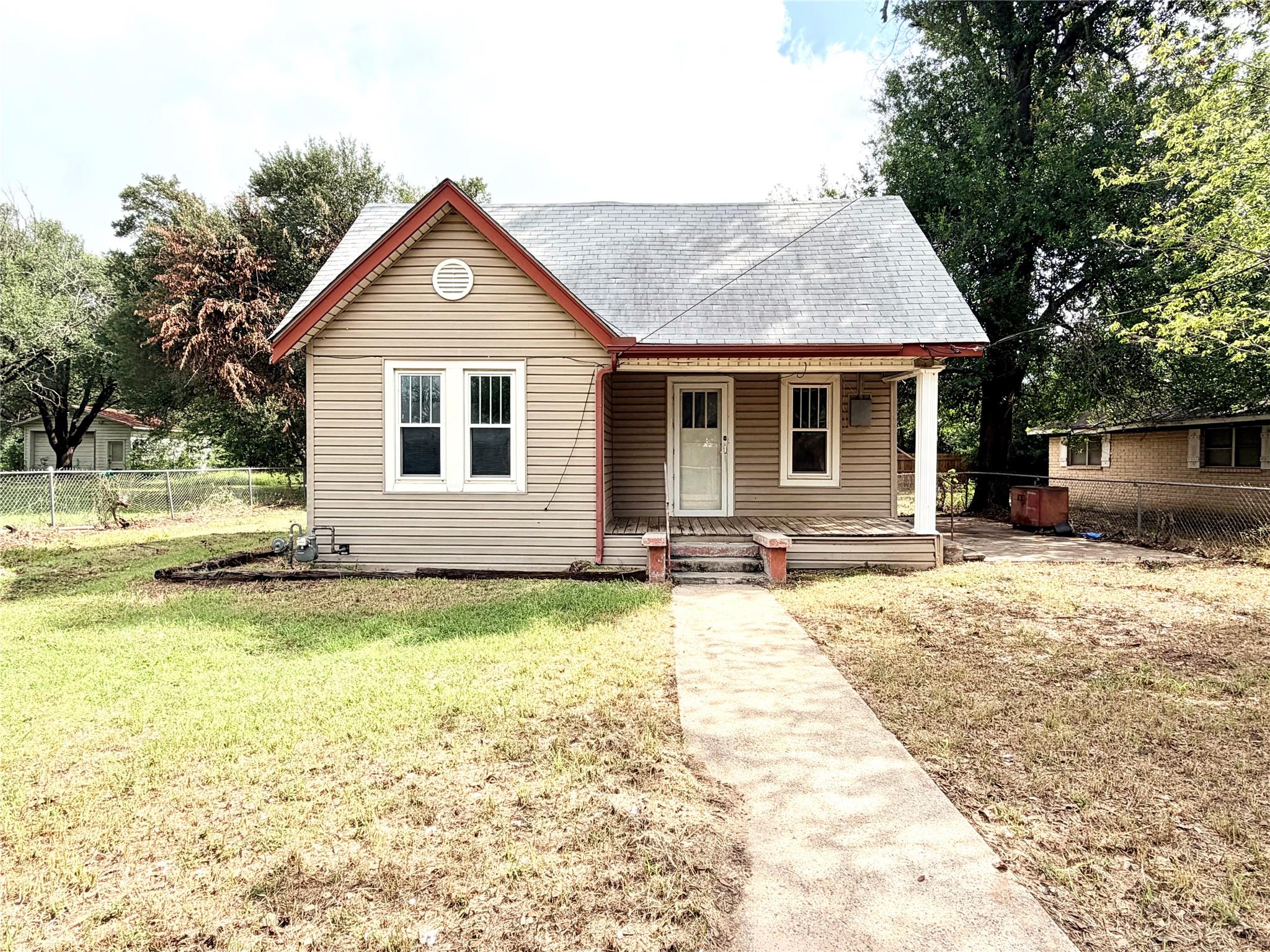 A charming single-story residence with a welcomin