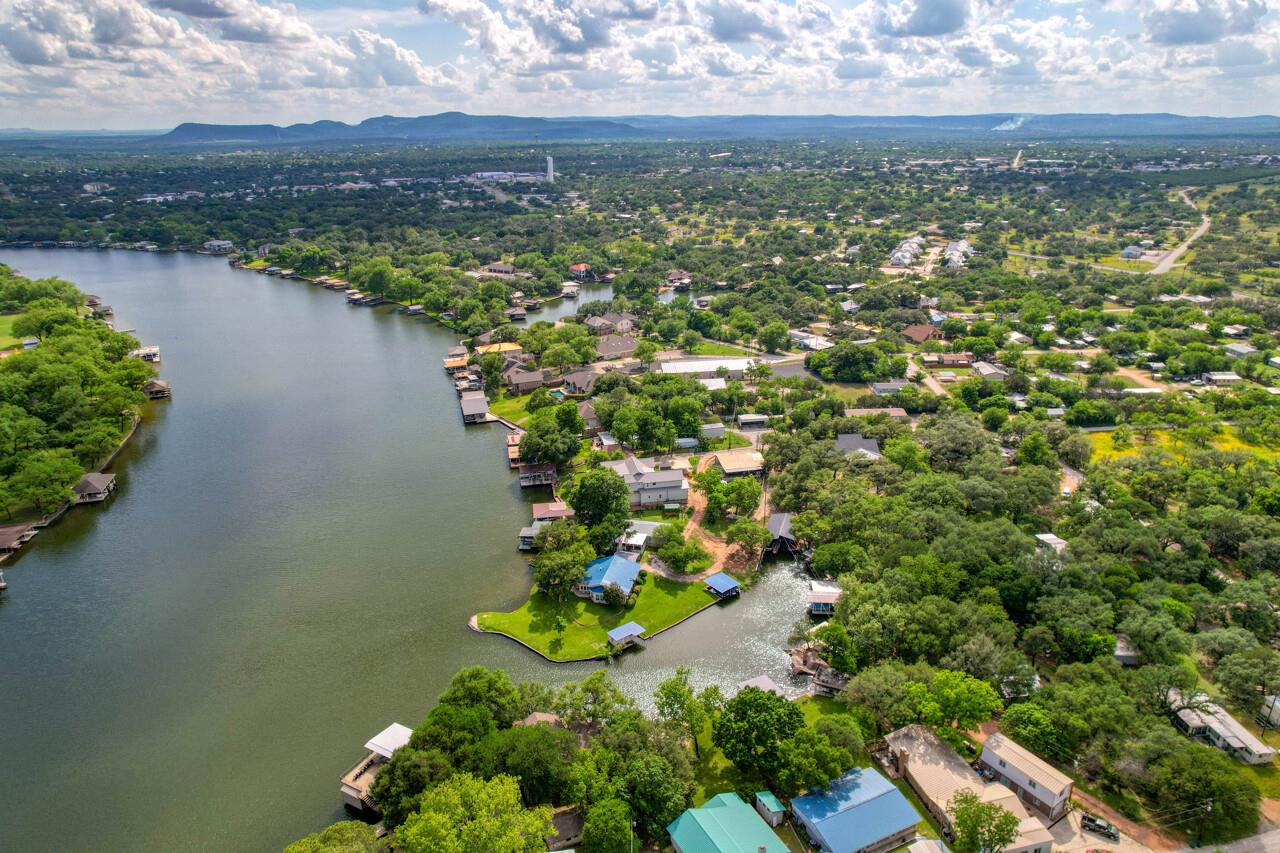 An aerial panorama reveals a picturesque lakefron
