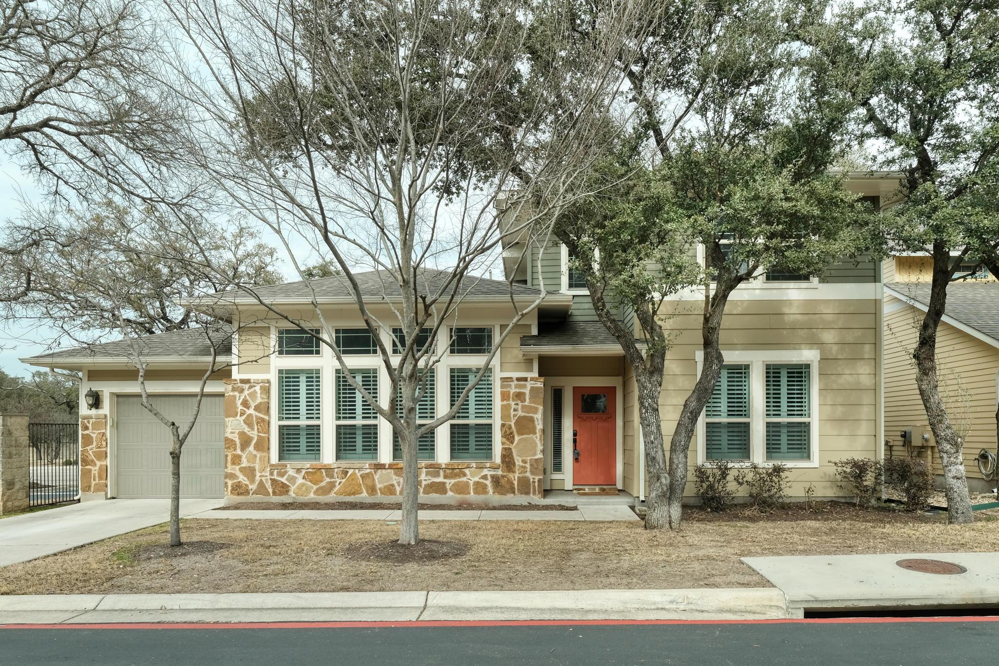 A well-maintained residence with a charming coral
