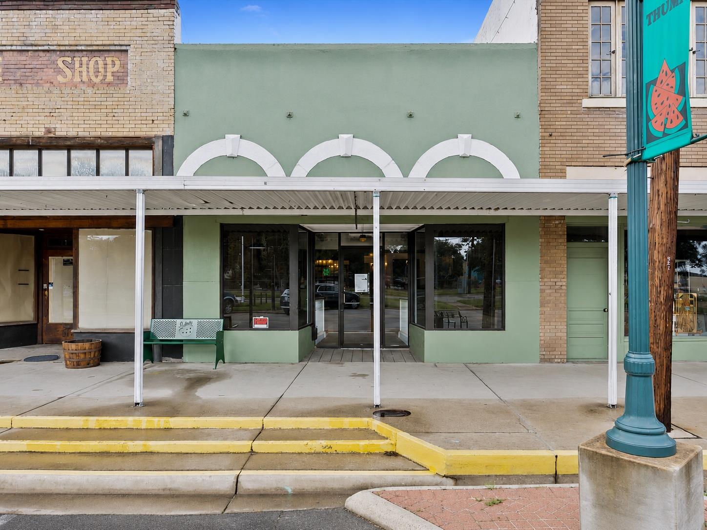 A classic storefront facade with an inviting awni