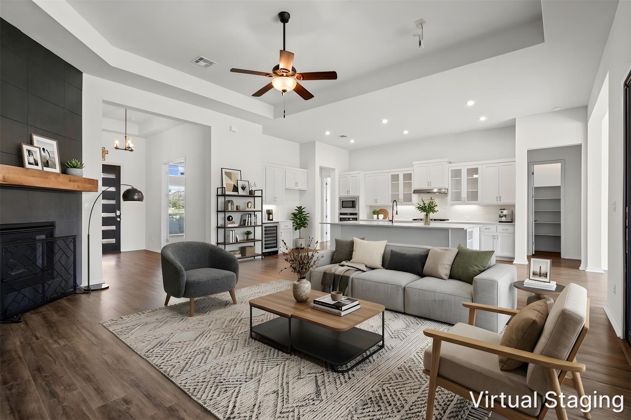 An open-concept living space integrates a well-ap