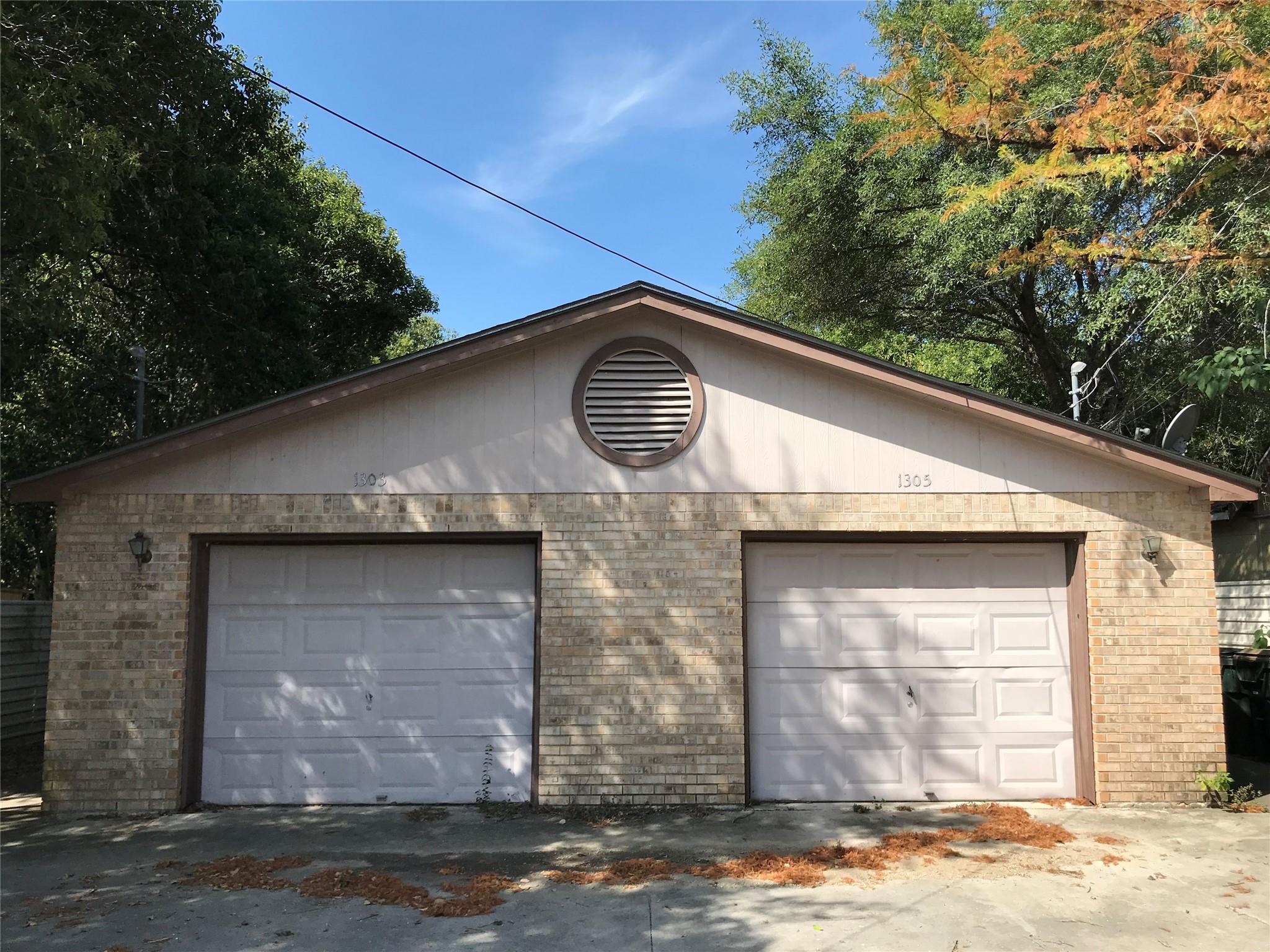 Two individual garage doors offer ample parking s