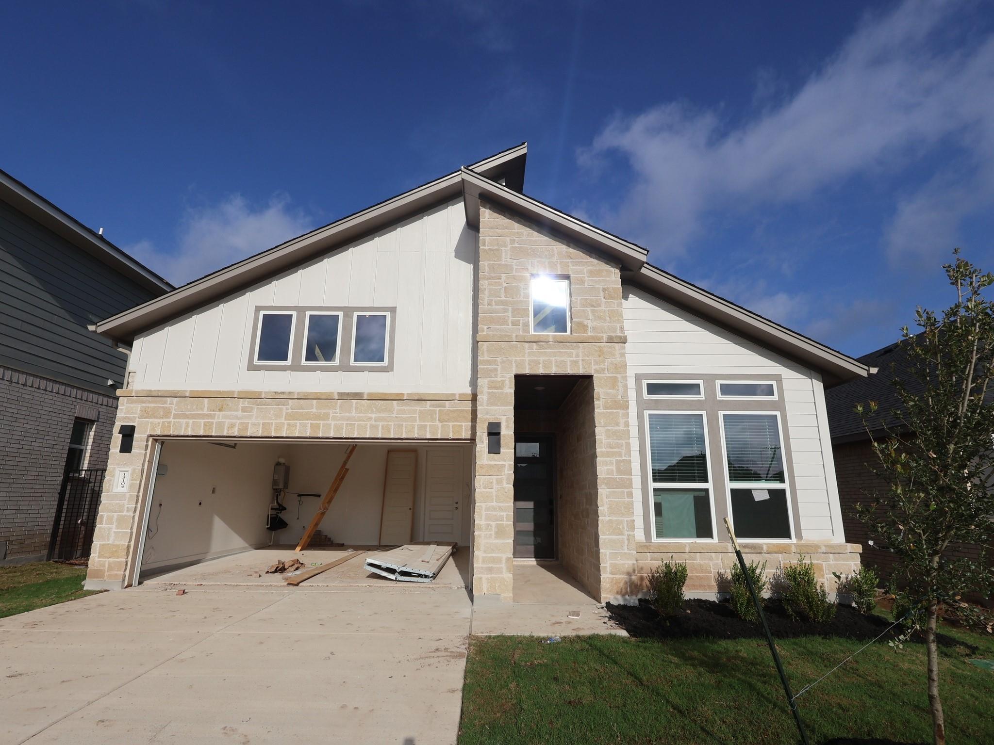 A newly constructed residence features an invitin