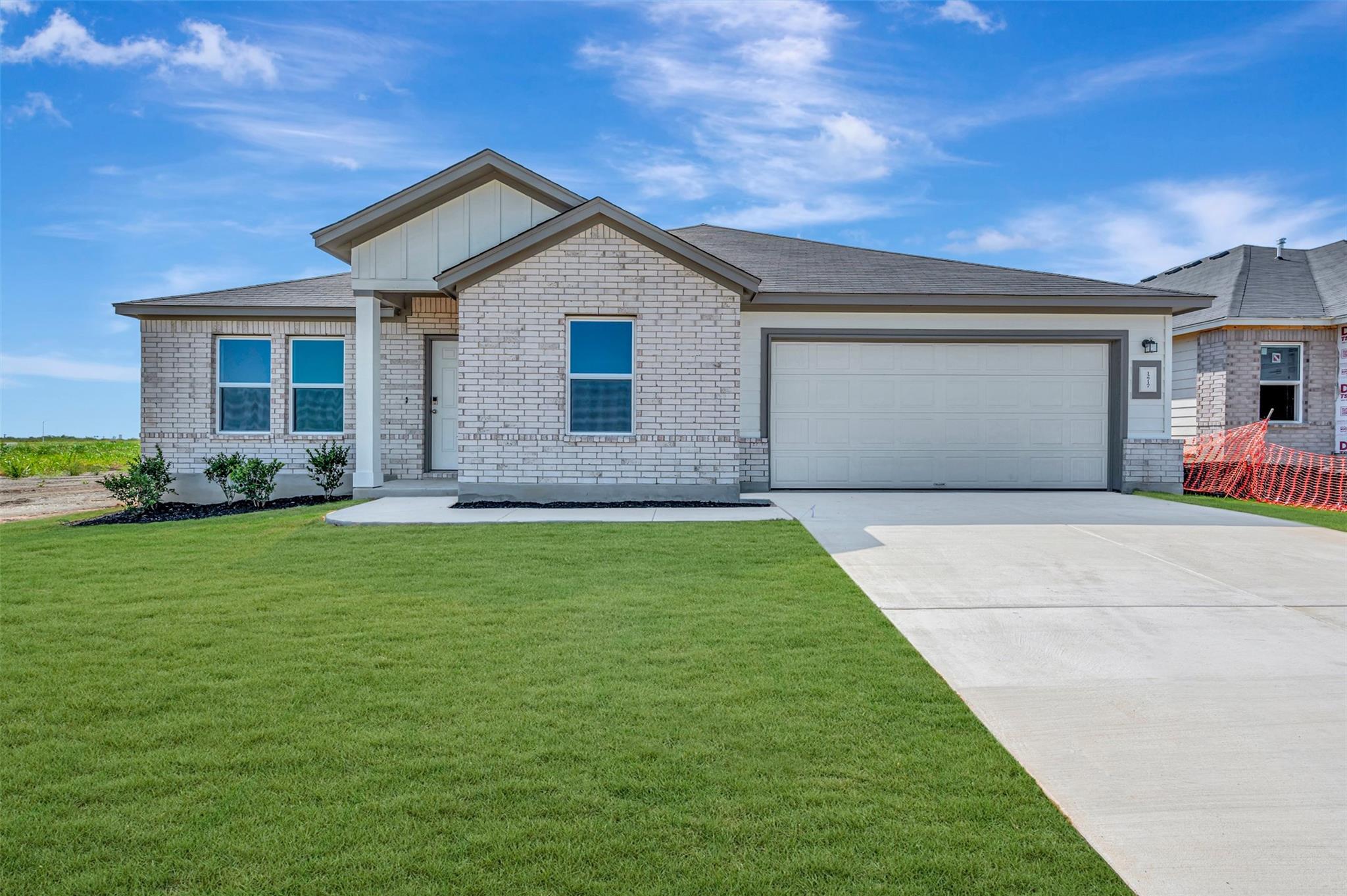 A newly constructed single-family home presents a