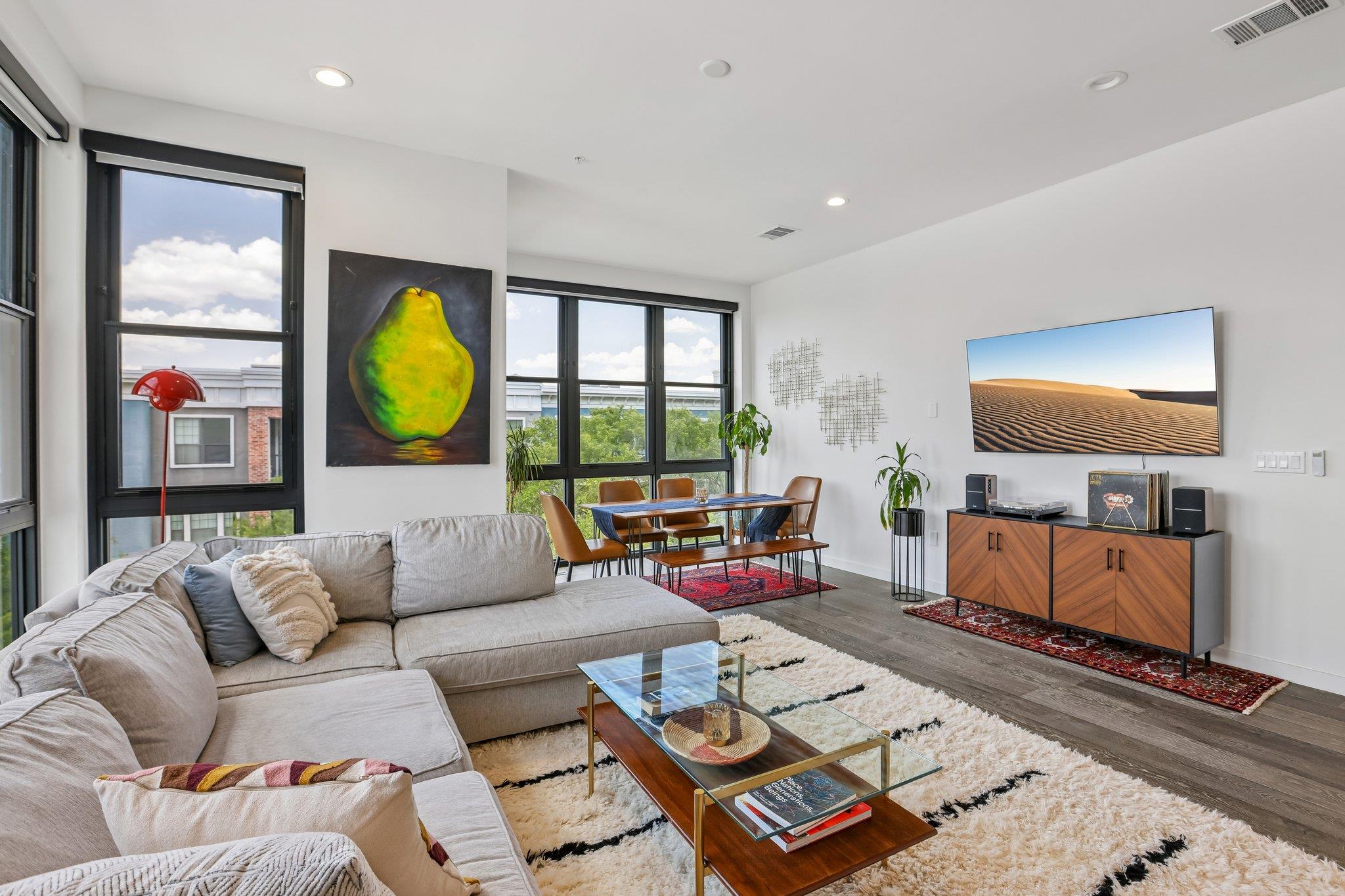 Natural light floods this living area, offering a