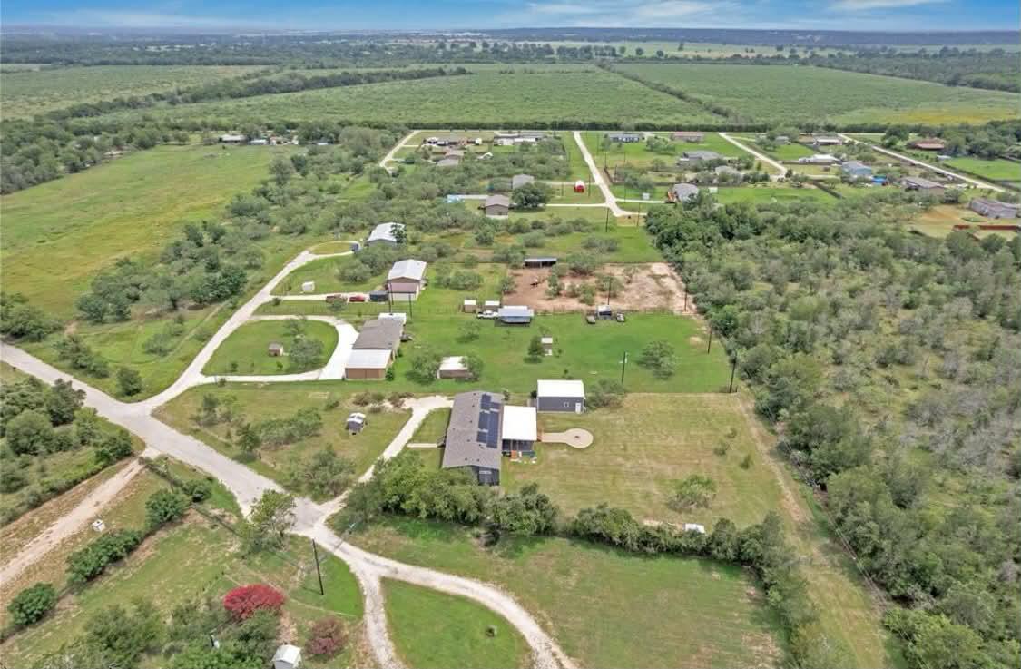 An aerial perspective reveals a vast rural landsc