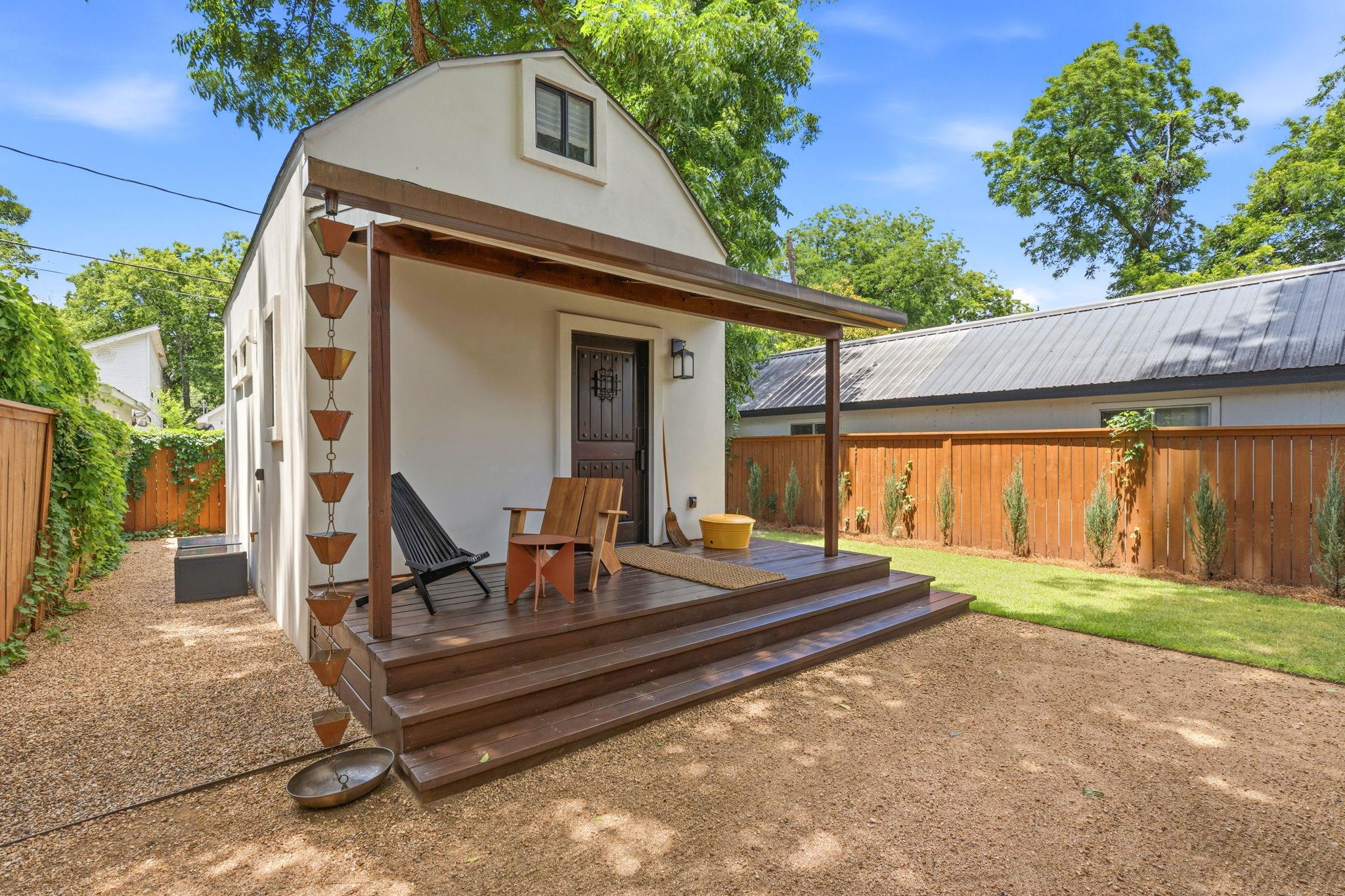 A charming backyard retreat with a raised wooden 