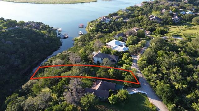 Perched above the water, a prime lot awaits your 