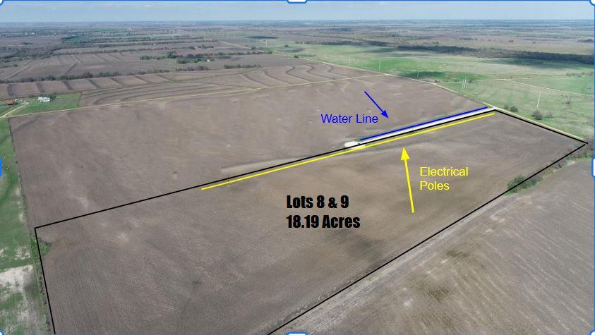 A vast, fertile lot with prominent utility access.