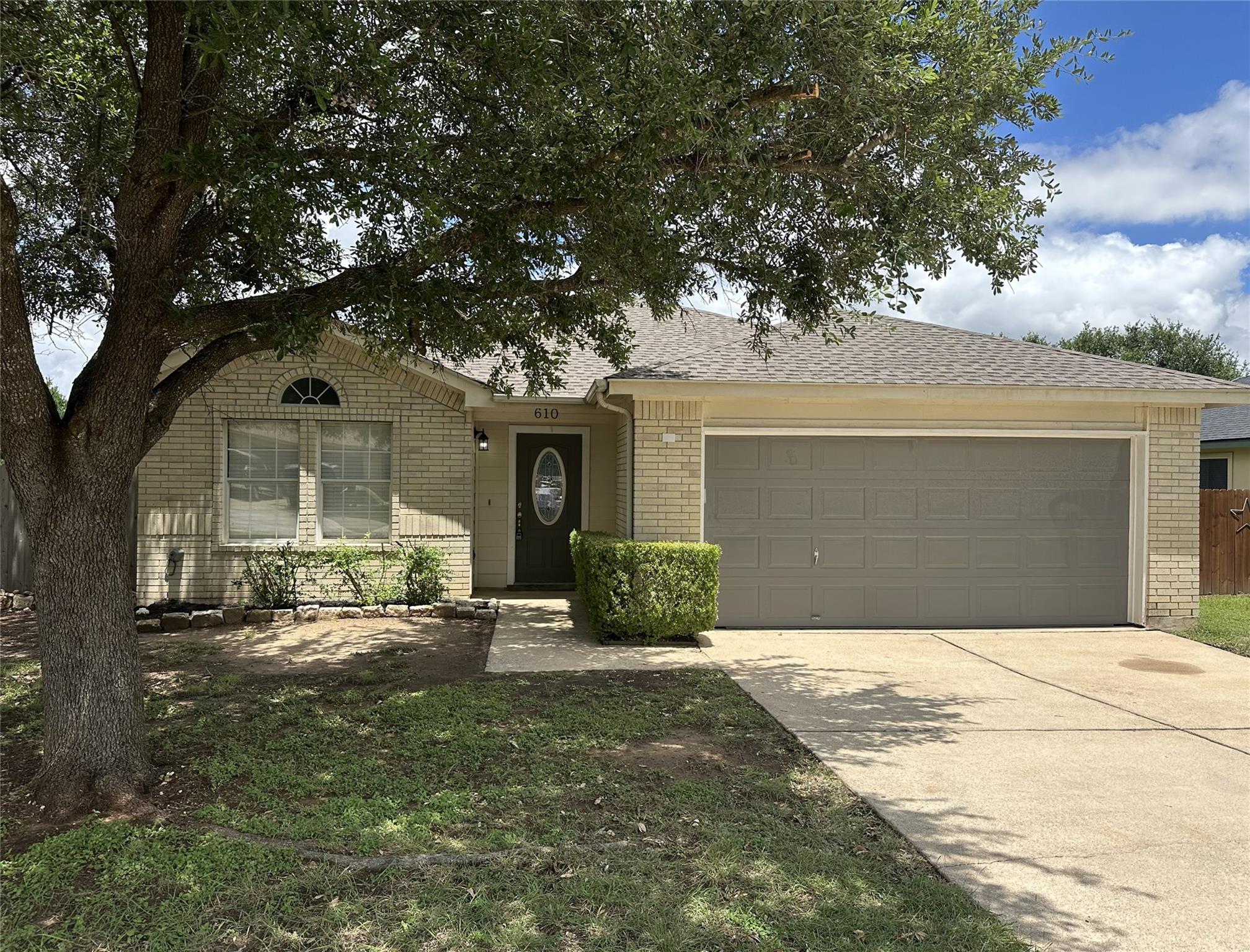 A classic brick exterior with an inviting entry a