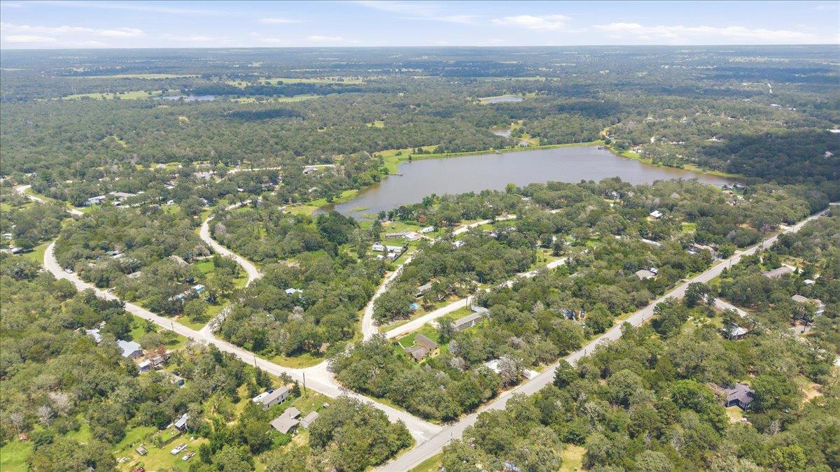 Vast natural landscapes encompass a serene lake a